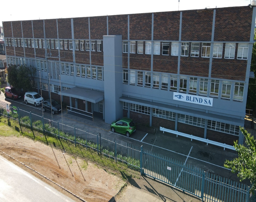 A Air photograph of Blind SA in Alrode. There is 3 floors in this buidling. You can see the big Blind SA sign on the left hand side of the building.