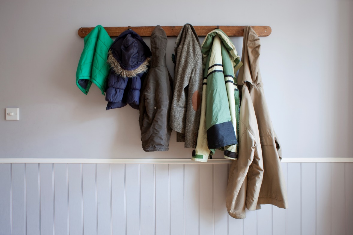 hallstand with clothes arranged in ascending order