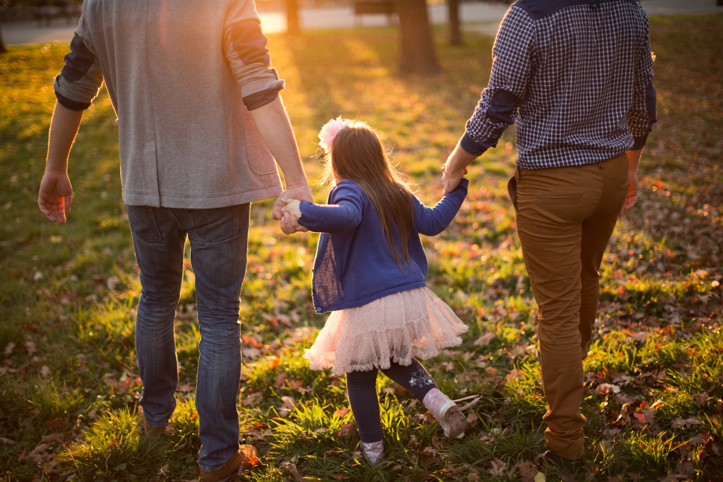 parents playing with child